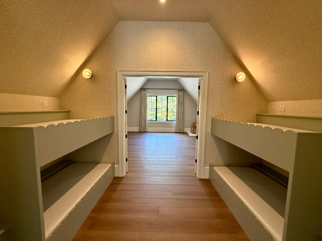 Finished interior with wall lighting